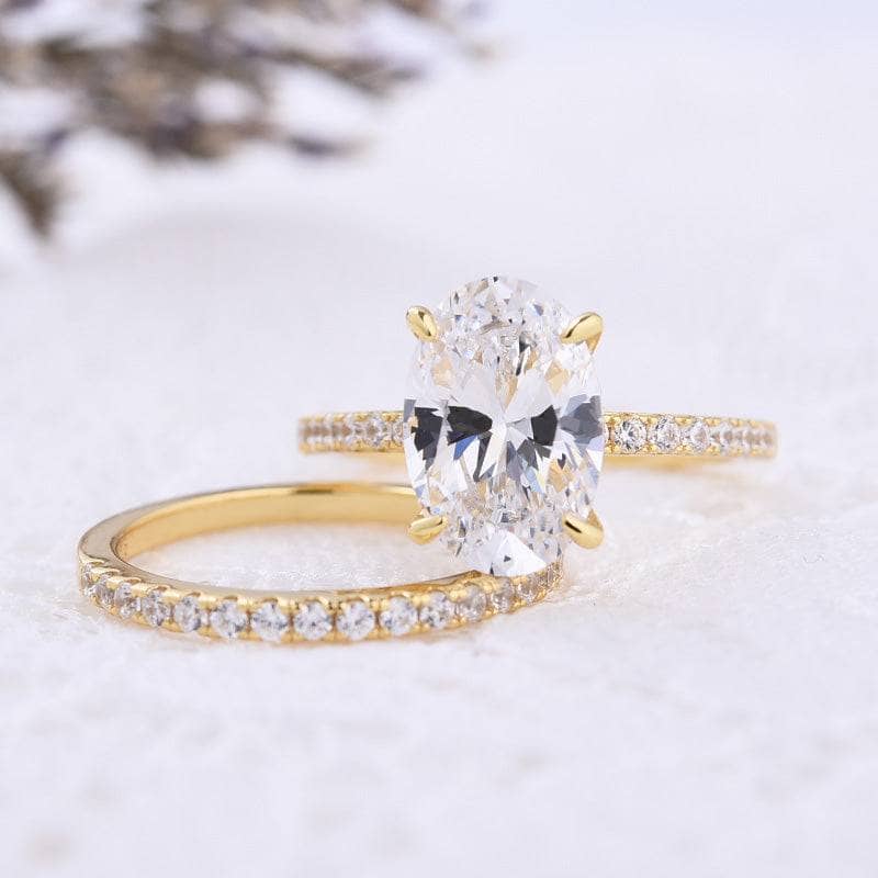 Yellow Gold Oval Cut Simulated Diamond Wedding Ring Set from Black