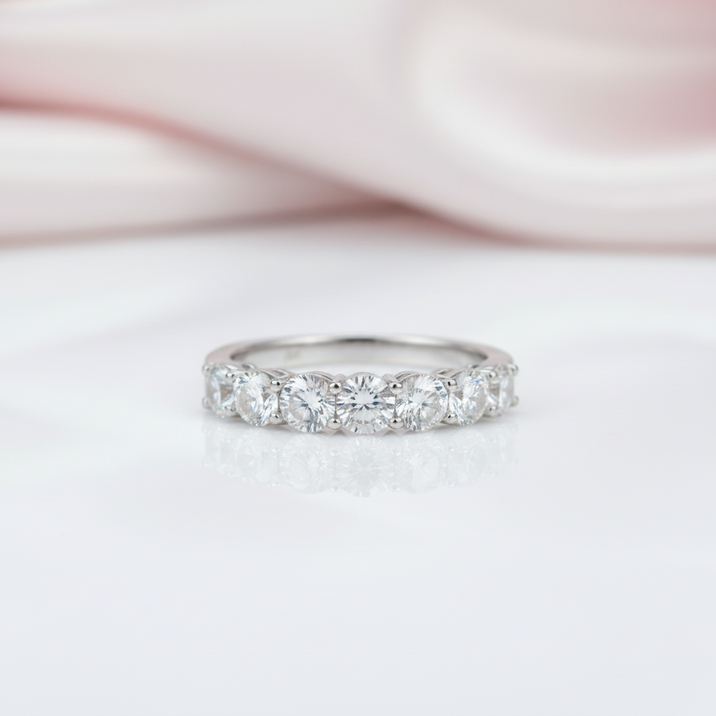 Diamond ring on a soft pink and white background