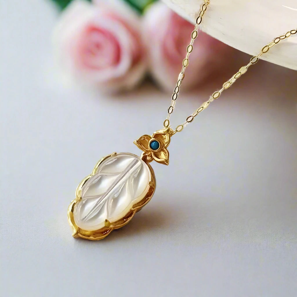 18k Yellow Gold Leaf Pendant Necklace With White Shell-Black Diamonds New York