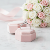 Diamond ring in a pink box with flowers in the background
