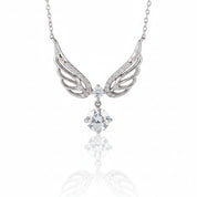 Silver angel wing pendant necklace with clear crystals, featuring a detailed wing design and a dangling clear gemstone, shown on a reflective white surface.