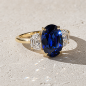3.5ct Three Stone Blue Sapphire Oval Cut Yellow Gold Engagement Ring-Black Diamonds New York