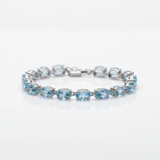 25.26 Ctw Sky Blue Topaz Tennis Bracelet-Black Diamonds New York