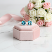14k Rose Gold Cushion Swiss Blue Topaz with 0.07ct Diamond Options Earrings-Black Diamonds New York