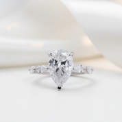 3.0 Carat Pear Cut Engagement Ring With Marquise Cut Side Stone-Black Diamonds New York