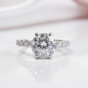 Diamond ring with a clear gemstone on a white background