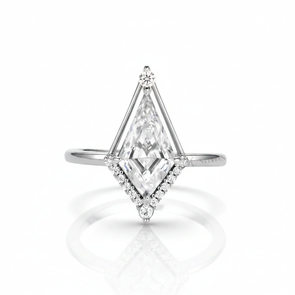 A silver-toned diamond ring featuring a large triangular-cut center stone with a halo of smaller round stones, shown on a white marble background with the Samstin brand logo in the top left.