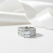 Diamond ring on a white fabric background