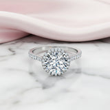 Round-cut Diamond Option Four Prong Halo Engagement Ring