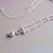Retro Punk Skull Stick Bone Necklace-Black Diamonds New York