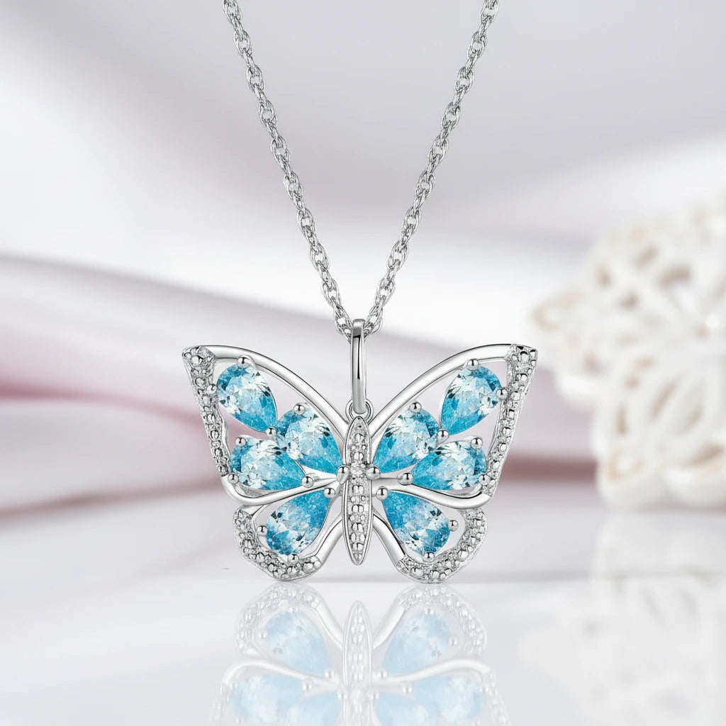 1.9 Ct Pear-cut Blue Topaz Gemstone Butterfly Pendant Necklace-Black Diamonds New York