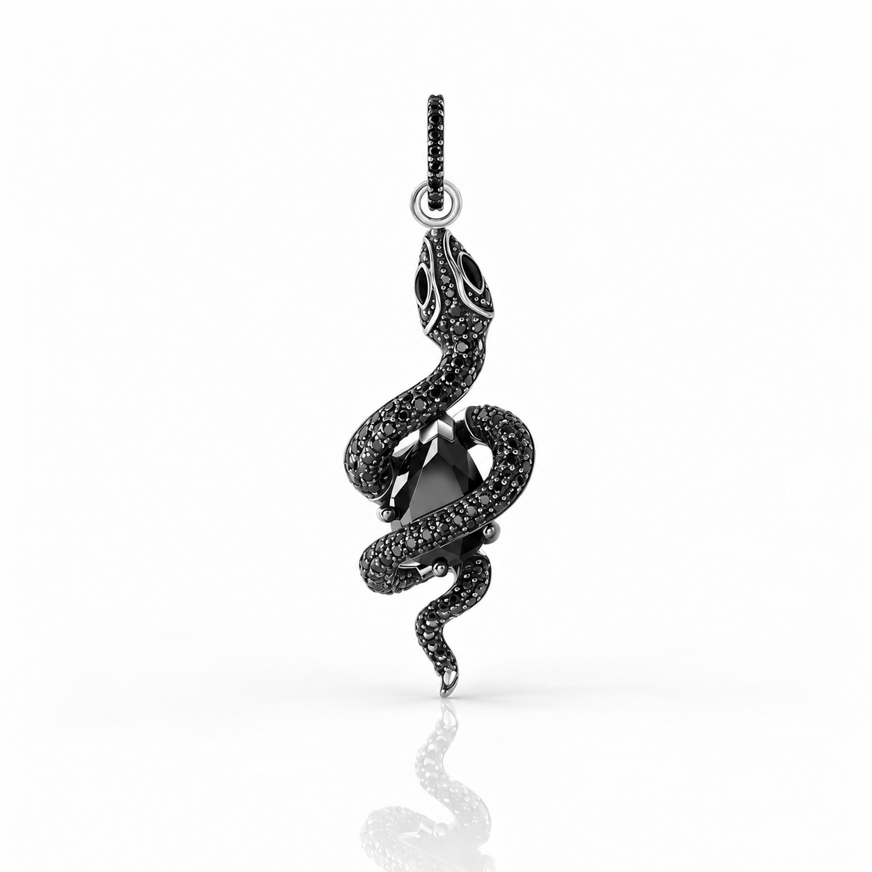 A black snake pendant with a central black gemstone, set in silver-toned metal and detailed with small black stones, shown on a clean white background with a soft reflection below.