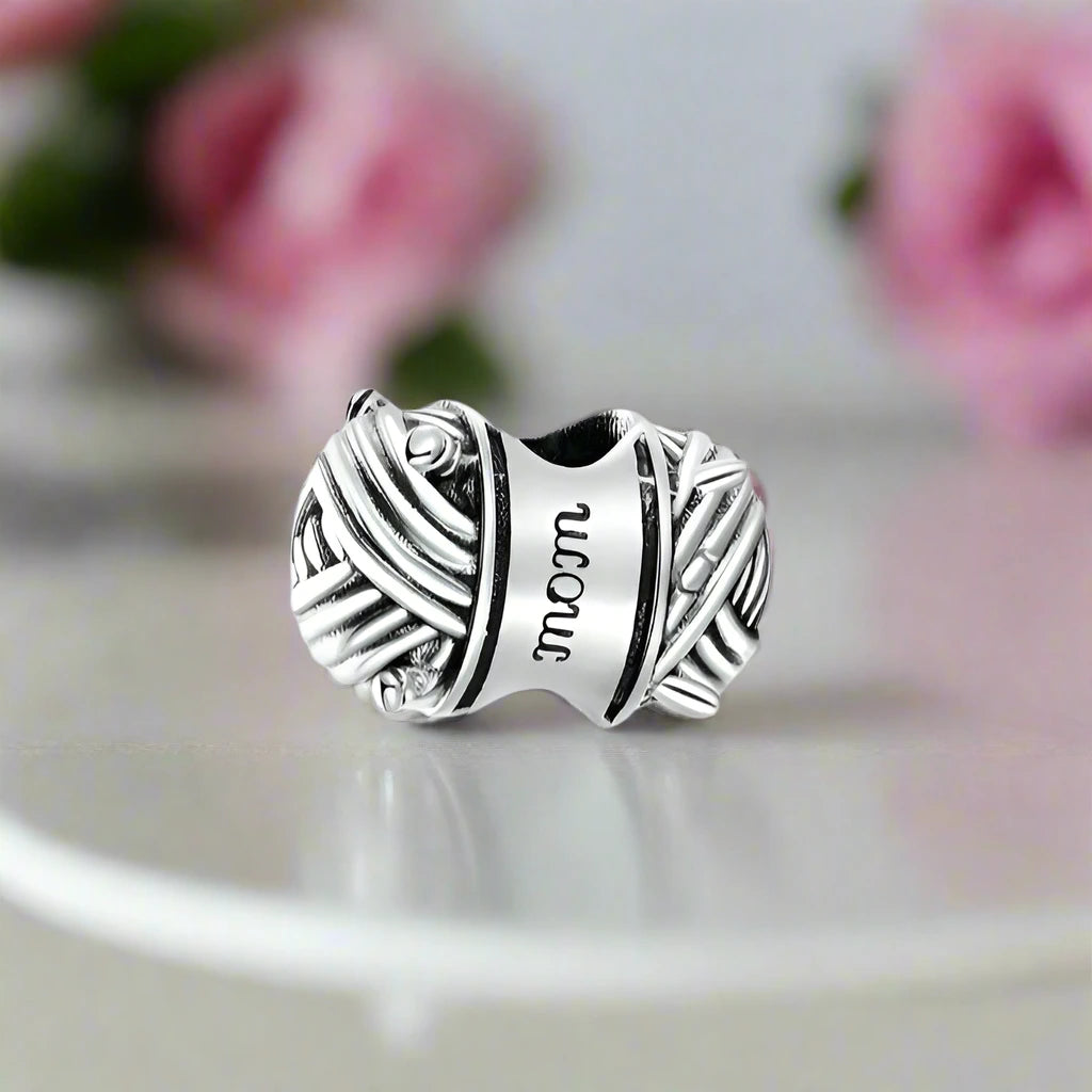 Ball of Yarn Charm with Pink Diamond-Black Diamonds New York