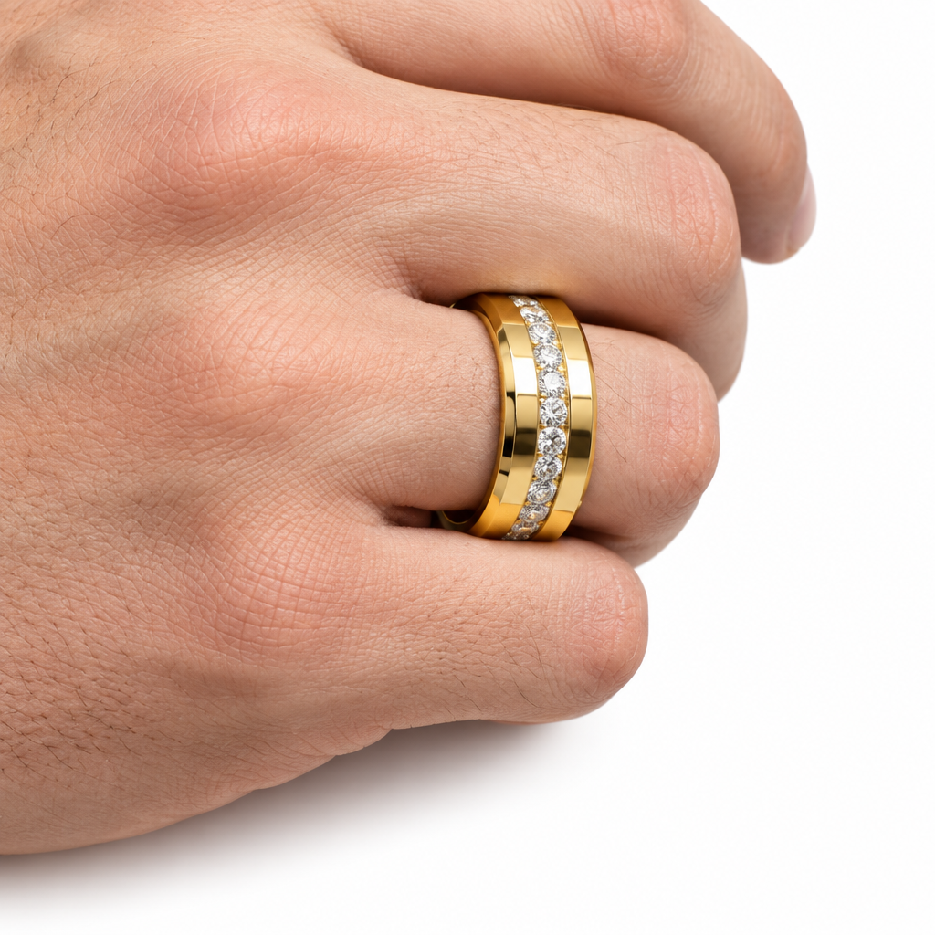 A close-up of a hand wearing a yellow gold eternity ring with a channel-set row of clear diamonds on one band, set against a clean white background.