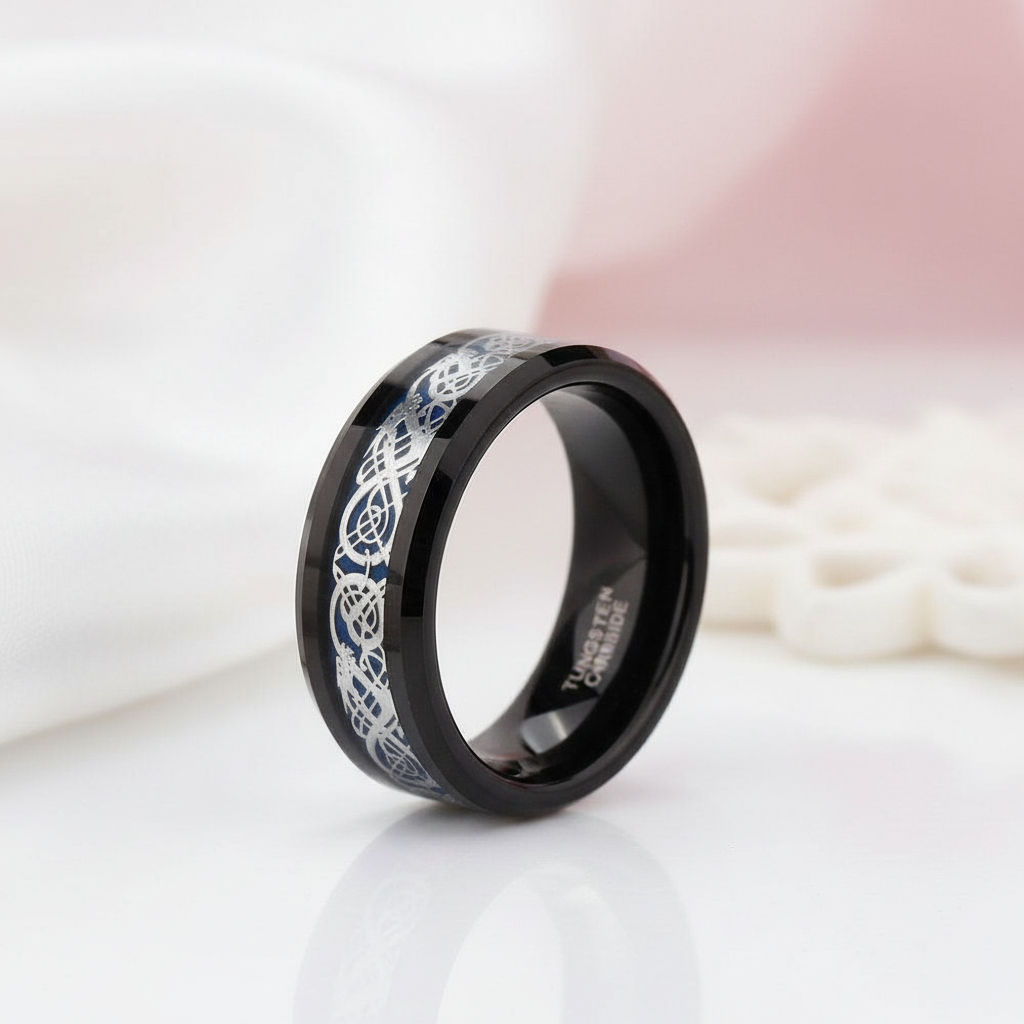 Black tungsten ring with silver Celtic knot design on a white background