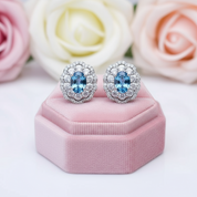 Oval Cut Blue Topaz Stud Earrings-Black Diamonds New York