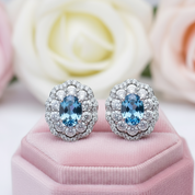 Oval Cut Blue Topaz Stud Earrings-Black Diamonds New York
