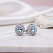Oval Cut Blue Topaz Stud Earrings-Black Diamonds New York