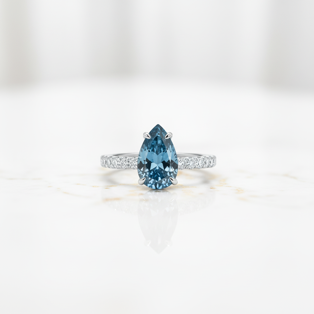 Pear Cut Blue Sapphire Engagement Ring-Black Diamonds New York