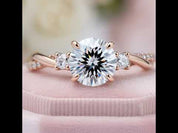 Twist Round Cut Three Stone Engagement Ring