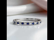 Half Eternity Blue And White Sapphire Wedding Band