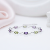 Marquise Cut Sky Blue Topaz, Peridot & Amethyst Bracelet-Black Diamonds New York