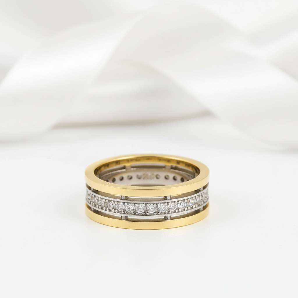 Two gold rings with diamond accents on a white background