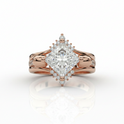 A rose gold ring featuring a large radiant-cut diamond center stone with smaller diamonds along the shoulders and a halo setting, shown on a clean white background with a soft reflection below.