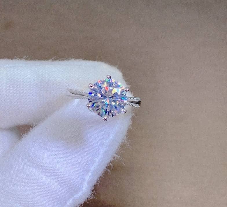 1 Carat Round Cut D Color Moissanite Ribbon Engagement Ring - Black Diamonds New York