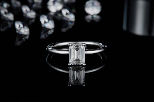 1.0Ct 5*7mm Emerald Cut Moissanite Solitaire Engagement Ring - Black Diamonds New York