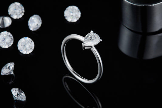 1.0Ct Pear Shape Moissanite Solitaire Engagement Ring - Black Diamonds New York