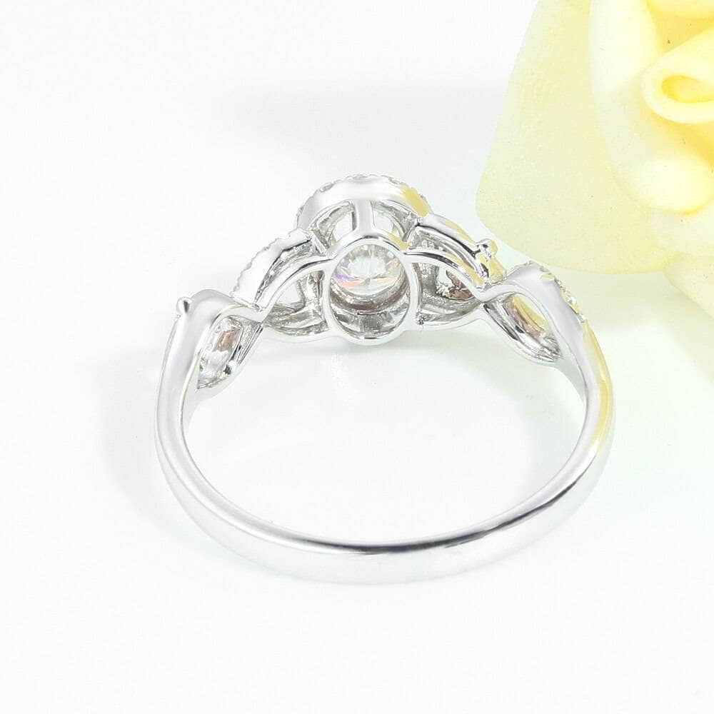 10 White Gold 5*7mm Oval Cut Halo Moissanite Engagement Ring - Black Diamonds New York