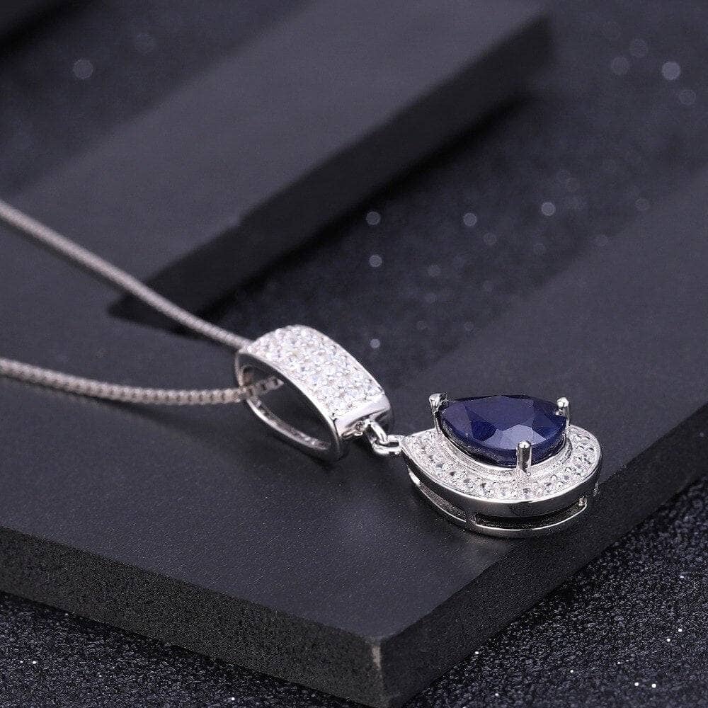 1.29Ct Natural Water Drop Blue Sapphire Elegant Pendant Necklace - Black Diamonds New York