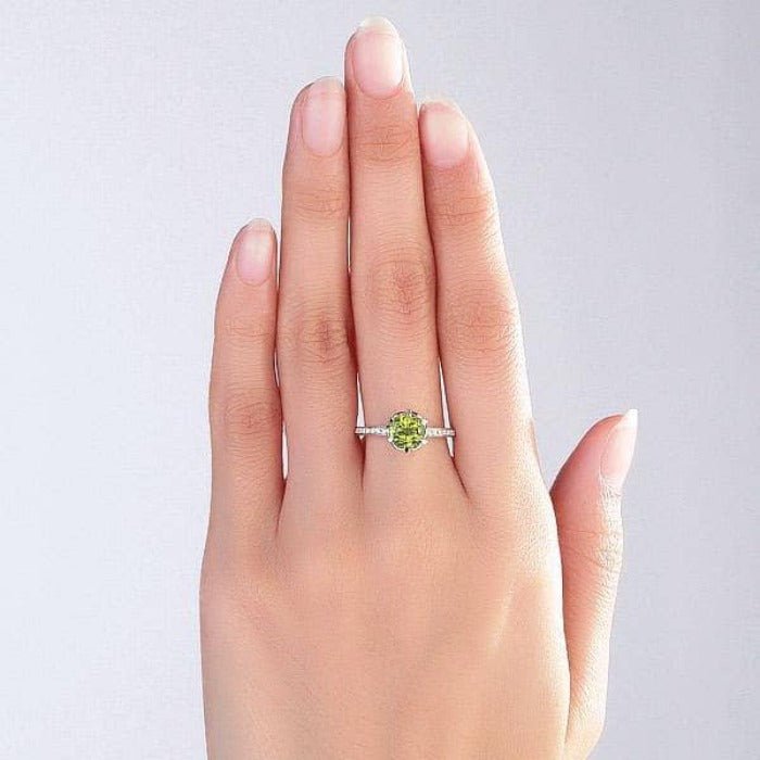 Thin Shank Cushion Cut Peridot Ring With Diamond Accents | Angara