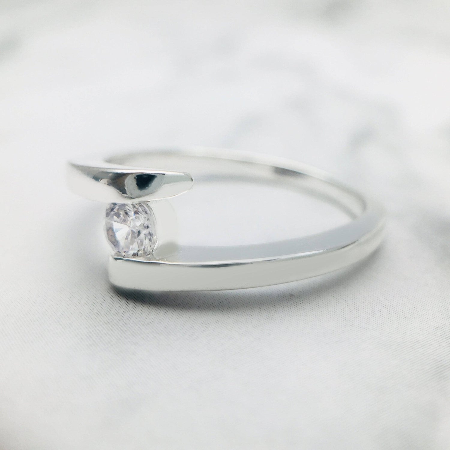 Round Cut Moissanite Minimalist Design Engagement Ring - Black Diamonds New York