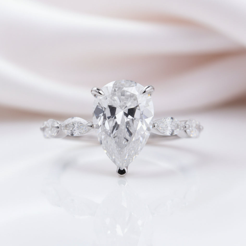 3.0 Carat Pear Cut Engagement Ring With Marquise Cut Side Stone-Black Diamonds New York