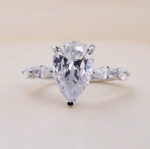 3.0 Carat Pear Cut Engagement Ring With Marquise Cut Side Stone-Black Diamonds New York