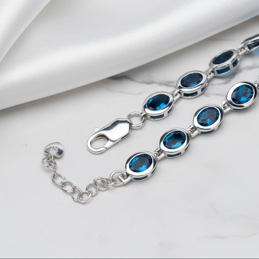 Oval London Blue Topaz Gemstone Bracelet-Black Diamonds New York