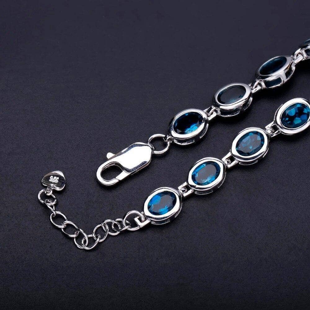 5x7mm Oval London Blue Topaz Gemstone Bracelet-Black Diamonds New York