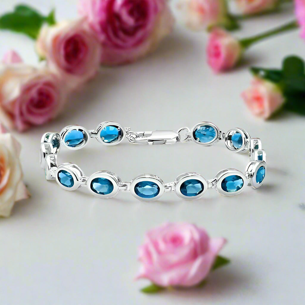 Oval London Blue Topaz Gemstone Bracelet-Black Diamonds New York