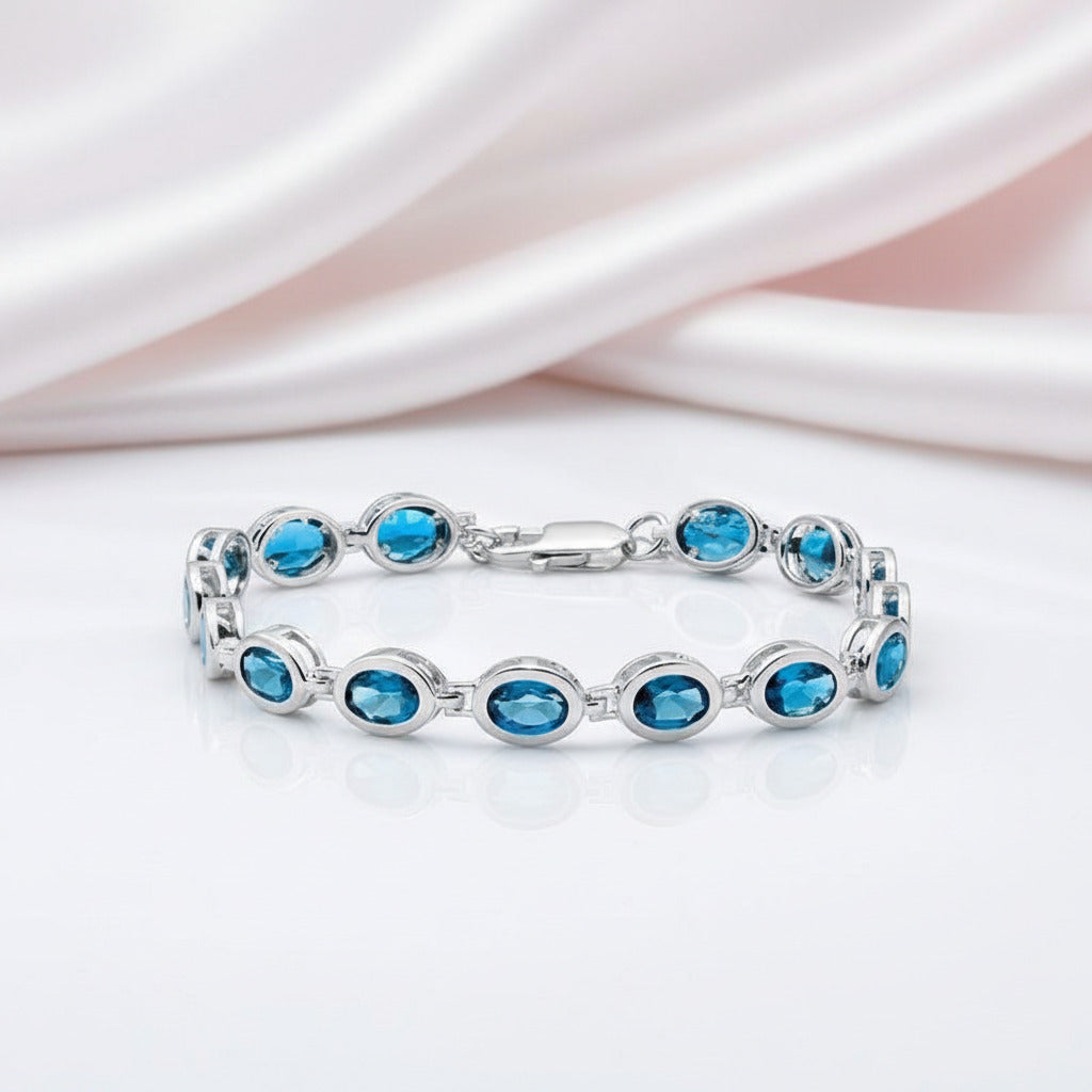Oval London Blue Topaz Gemstone Bracelet-Black Diamonds New York