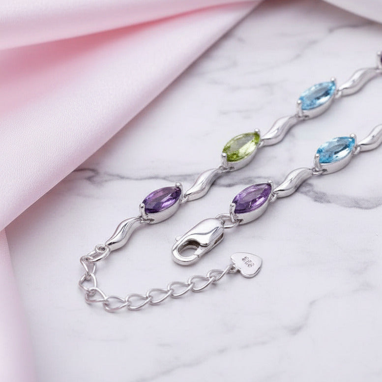 Marquise Cut Sky Blue Topaz, Peridot & Amethyst Bracelet-Black Diamonds New York