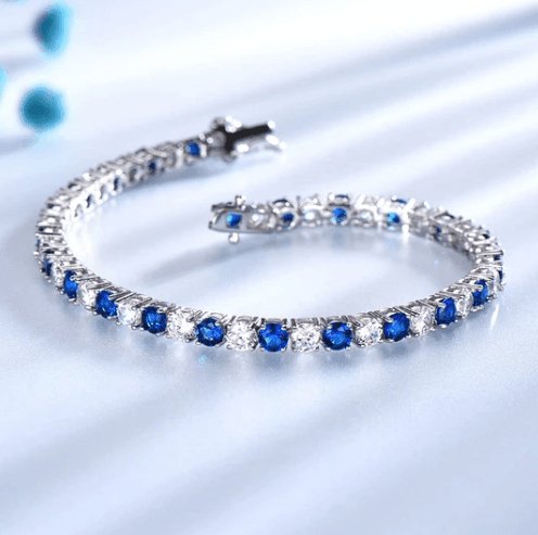 Elegant Blue Round Cut Bracelet In Sterling Silver - Black Diamonds New York