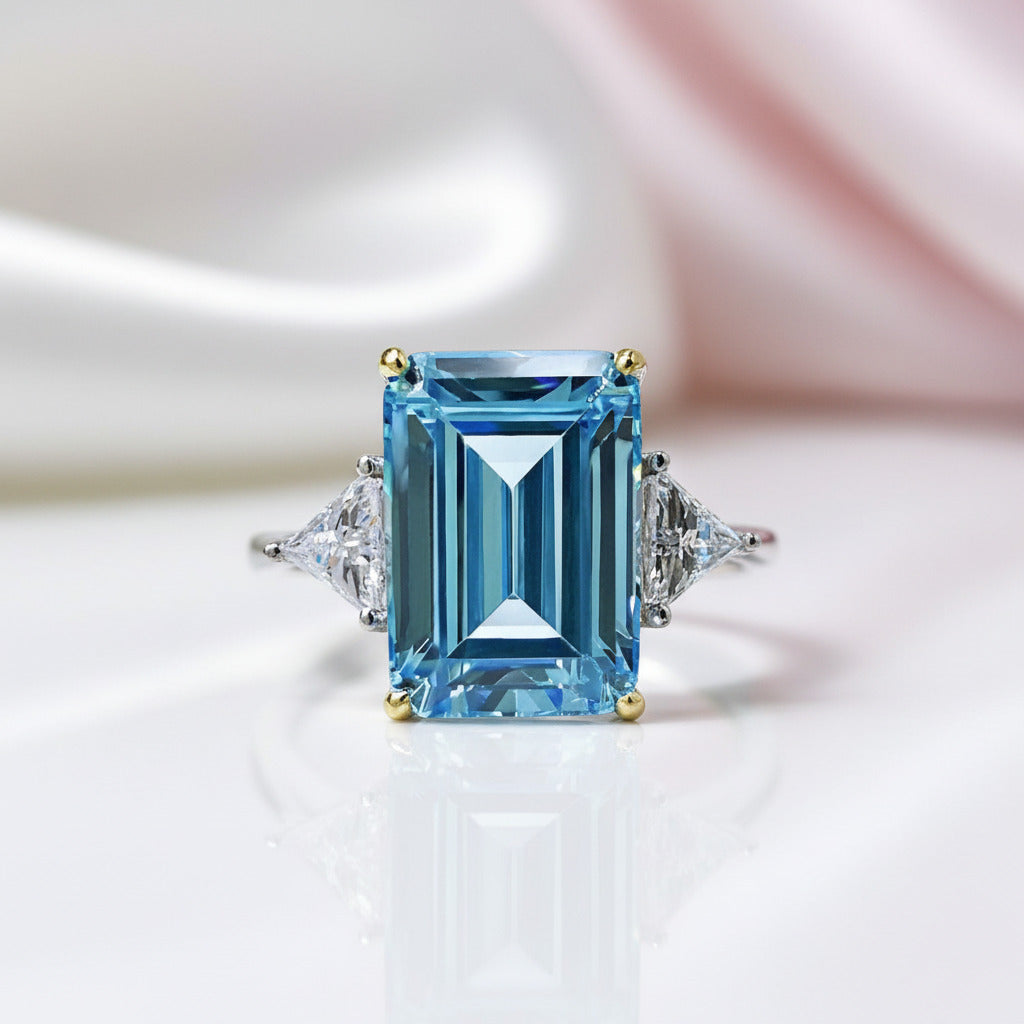 Sky Blue Simulated Diamond Option in Emerald Cut Three Stone Engagement Ring-Black Diamonds New York