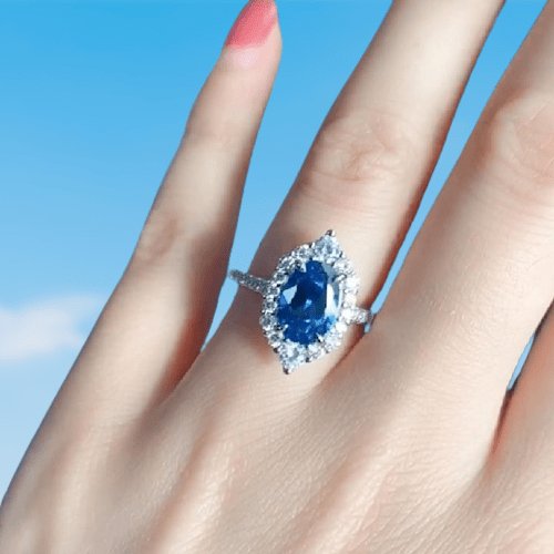 Halo Oval Cut Blue Sapphire Engagement Ring-Black Diamonds New York