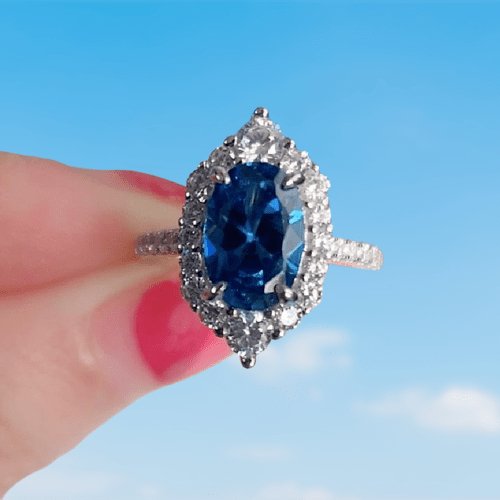 Halo Oval Cut Blue Sapphire Engagement Ring-Black Diamonds New York