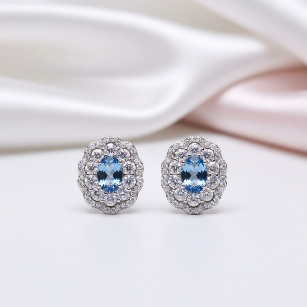 Oval Cut Blue Topaz Stud Earrings-Black Diamonds New York