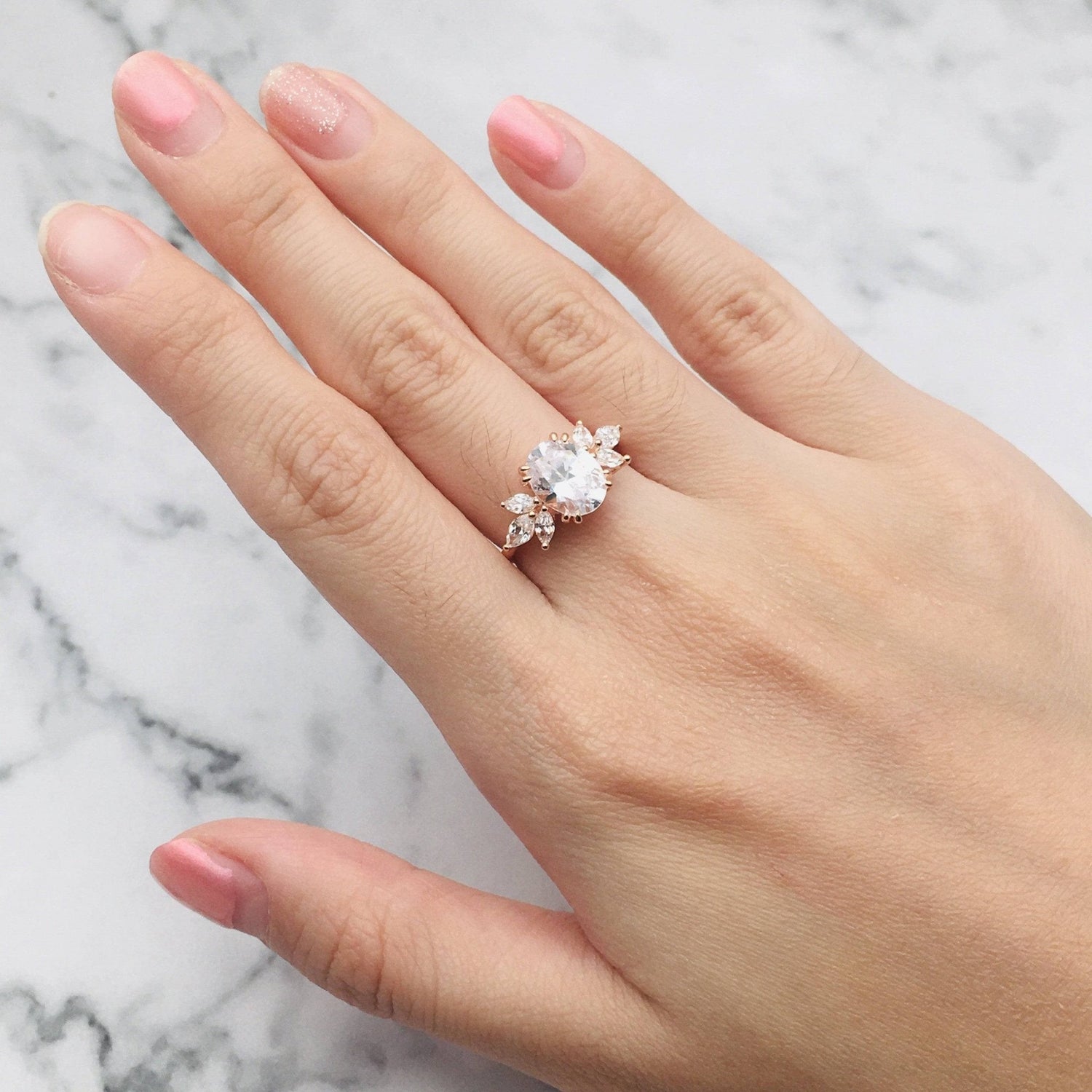 oval cut moissanite rose gold dainty engagement ring