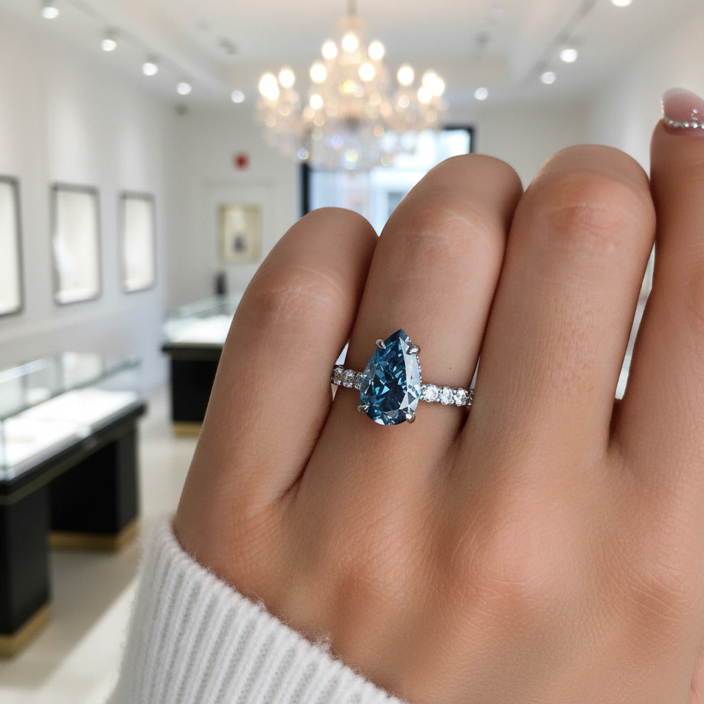 Pear Cut Blue Sapphire Engagement Ring-Black Diamonds New York