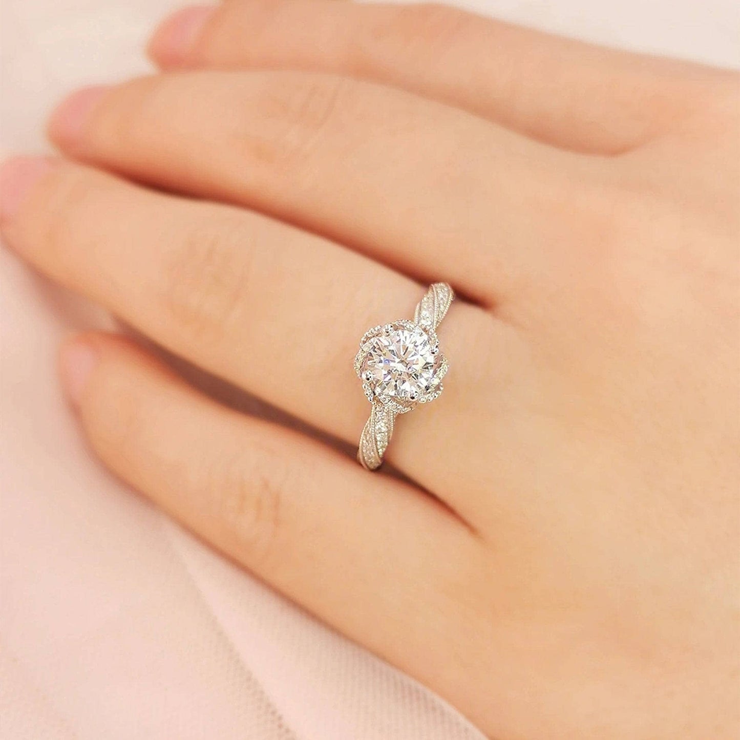 Round Cut Moissanite Halo Twist Engagement Ring - Black Diamonds New York